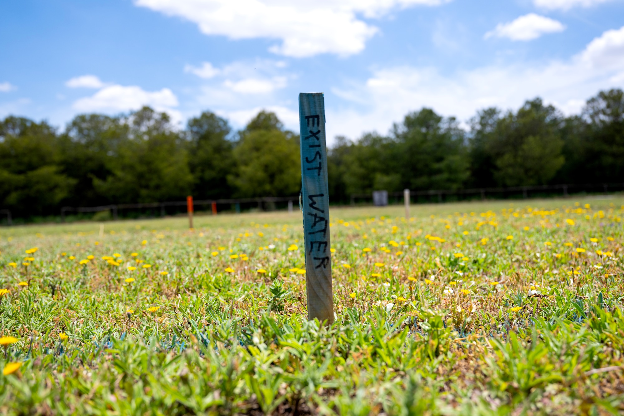 A stake sits in the ground as a plot point for a future dog park on May 12, 2025, at Moron Air Base, Spain.