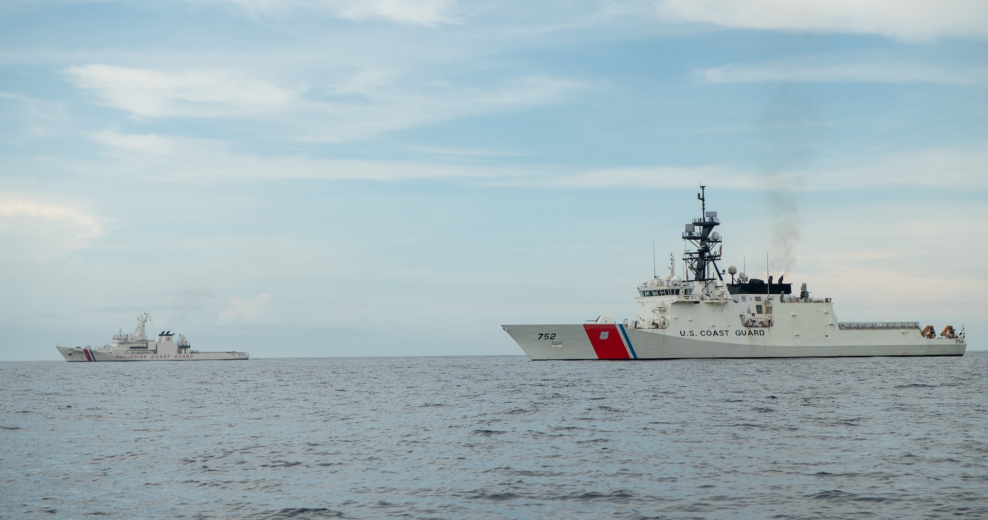 The Legend-class USCGC Stratton (WMSL 752) sails with Philippine Coast Guard Vessel BRP Melchora Aquino (MRRV-9702) during a division tactics exercise in the Sulu Sea, May 20, 2025. Stratton is deployed and assigned to Destroyer Squadron (DESRON) 15, the Navy’s largest DESRON and the U.S. 7th Fleet’s principal surface force. The U.S. Coast Guard has operated in the Indo-Pacific for more than 150 years, and the service is increasing efforts through targeted bilateral patrols with our national security cutters, fast response cutters, and other activities conducted in support of maritime missions to enhance our regional partnerships. (U.S. Coast Guard photo by Petty Officer 3rd class William Kirk)