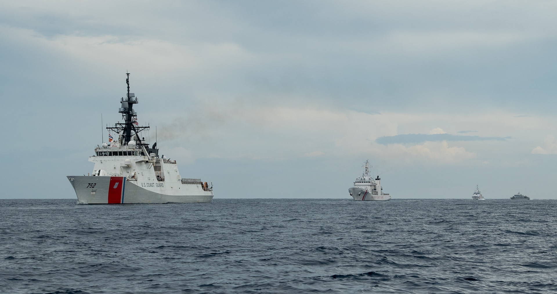 The Legend-class USCGC Stratton (WMSL 752) sails with Philippines Navy and Coast Guard vessels as part of a division tactics exercise in the Sulu Sea, May 20, 2025. Stratton is deployed and assigned to Destroyer Squadron (DESRON) 15, the Navy’s largest DESRON and the U.S. 7th Fleet’s principal surface force.  Stratton is deployed and assigned to Destroyer Squadron (DESRON) 15, the Navy’s largest DESRON and the U.S. 7th Fleet’s principal surface force. The U.S. Coast Guard has operated in the Indo-Pacific for more than 150 years, and the service is increasing efforts through targeted bilateral patrols with our national security cutters, fast response cutters, and other activities conducted in support of maritime missions to enhance our regional partnerships. (U.S. Coast Guard photo by Petty Officer 3rd class William Kirk)
