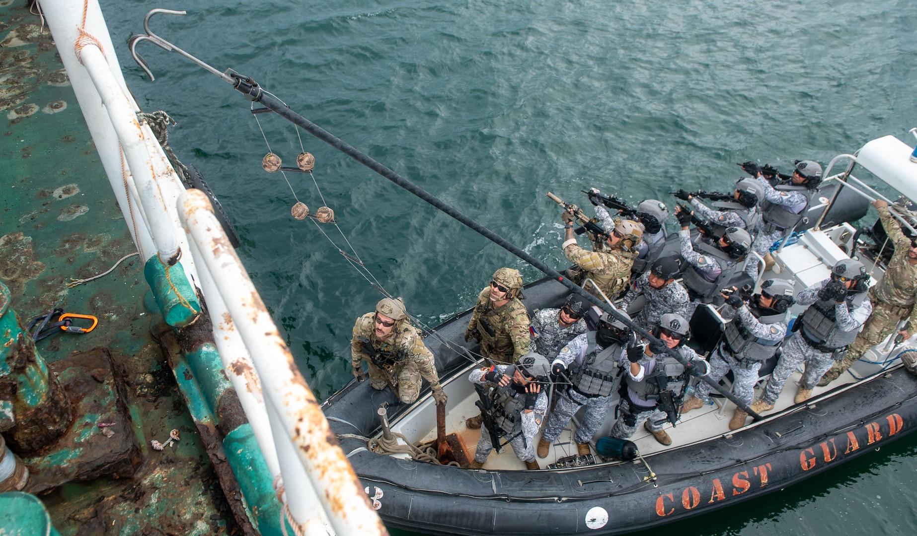 U.S. Coast Guard members from Maritime Security Response Team (MSRT) West operate alongside Philippine Coast Guard Special Operations Force members aboard a vessel as part of a training exercise in Puerto Princesa, Philippines, May 17, 2025. Stratton is deployed and assigned to Destroyer Squadron (DESRON) 15, the Navy’s largest DESRON and the U.S. 7th Fleet’s principal surface force. The U.S. Coast Guard has operated in the Indo-Pacific for more than 150 years, and the service is increasing efforts through targeted bilateral patrols with our national security cutters, fast response cutters, and other activities conducted in support of maritime missions to enhance our regional partnerships. (U.S. Coast Guard photo by Petty Officer 3rd Class William Kirk)