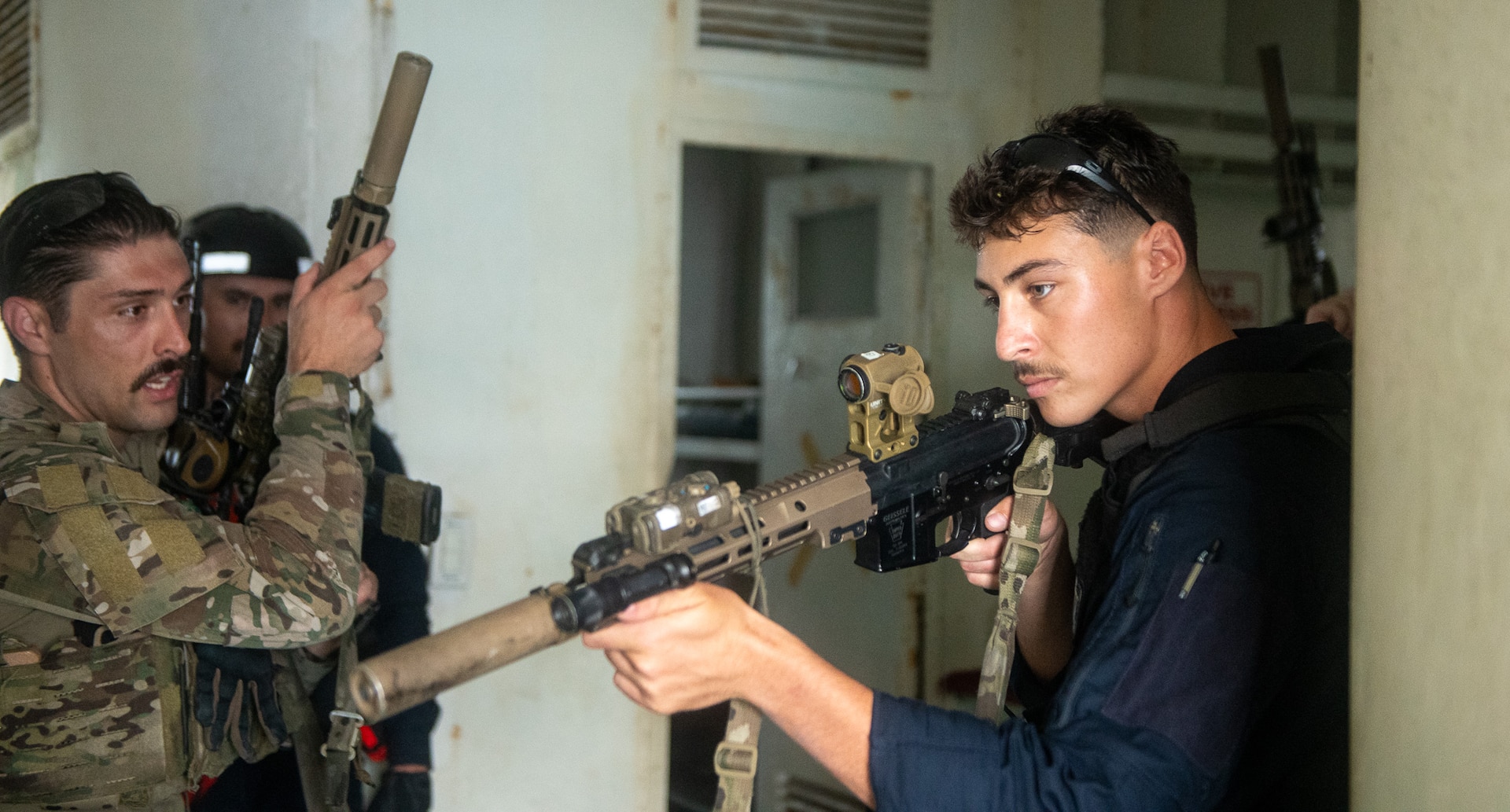 Petty Officer 3rd Class Thomas Librizzi of the Legend-class USCGC Stratton (WMSL 752) trains with U.S. Coast Guard members from Maritime Security Response Team (MSRT) West as part of a training exercise with the Philippine Coast Guard Special Operations Force in Puerto Princesa, Philippines, May 17, 2025. Stratton is deployed and assigned to Destroyer Squadron (DESRON) 15, the Navy’s largest DESRON and the U.S. 7th Fleet’s principal surface force. The U.S. Coast Guard has operated in the Indo-Pacific for more than 150 years, and the service is increasing efforts through targeted bilateral patrols with our national security cutters, fast response cutters, and other activities conducted in support of maritime missions to enhance our regional partnerships. (U.S. Coast Guard photo by Petty Officer 3rd Class William Kirk)