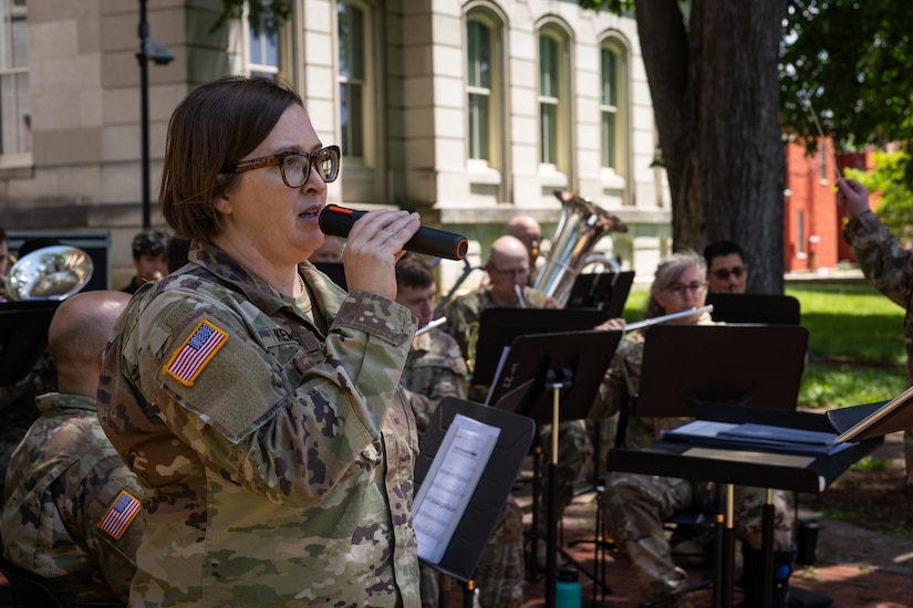 U.S. Army Sgt. Brittny Kempfer, a percussionist and vocalist for the Kentucky National Guard’s 202nd Army Band, sings the National Anthem at a concert at the Kentucky Historical Society’s (KHS) 200th anniversary event at the Old State Capitol in Frankfort, Ky. on May 17, 2025. The band supported the 200th anniversary of the French officer Marquis de Lafayette’s visit of Frankfort which was coordinated by the KHS. (U.S. Army National Guard photo by Sgt. 1st Class Andrew Dickson)