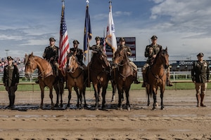 1st Infantry Division's Commanding General's Mounted Color Guard attends the Kentucky Derby, on May 2, 2025. For the first time, the 1st Infantry Division will perform the Passing of the Colors during the Kentucky Derby. (U.S. Army photos by Sgt. Tyler Selige)
