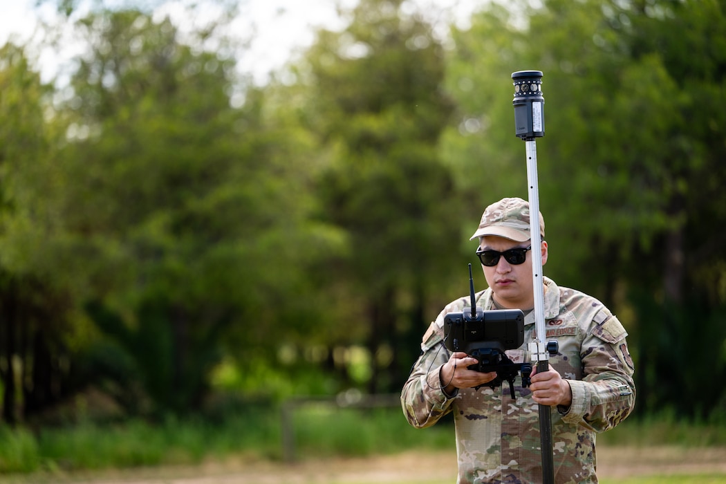 Senior Airman William Rivera, 446th Civil Engineer Squadron engineering assistant, plots points for a ground survey at Moron Air Base, Spain, on May 6, 2025.