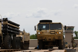 Soldiers from the 1st Infantry Division perform rail head operations on May 06, 2025, at Fort Riley, KS. Soldiers part of 1ID often need to move equipment across the country and around the world, ensuring fast and efficient railway operations makes sure they are able to complete the mission as best as possible.