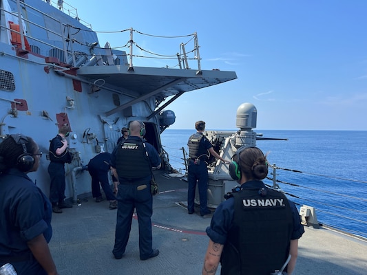 230901-N-N1574-1001 PORTSMOUTH, Va. (Sept. 1, 2023) Industrial Hygienists Jena Brunson and Mike Brown from the Navy and Marine Corps Force Health Protection Command monitor blast overpressure, noise, and lead exposure aboard USS Stout (DDG 55) during manual and remote firing of the MK 38 25mm machine gun and other shipboard systems, September 2023. These efforts support data-driven readiness decisions and reflect Navy Medicine’s commitment to safeguarding warfighter health during operational live-fire training. (U.S. Navy courtesy photo)