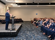 Sixteenth Air Force commander speaks to Air Force cadets and audience.