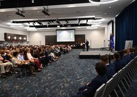 Sixteenth Air Force commander speaks to Air Force cadets and audience.