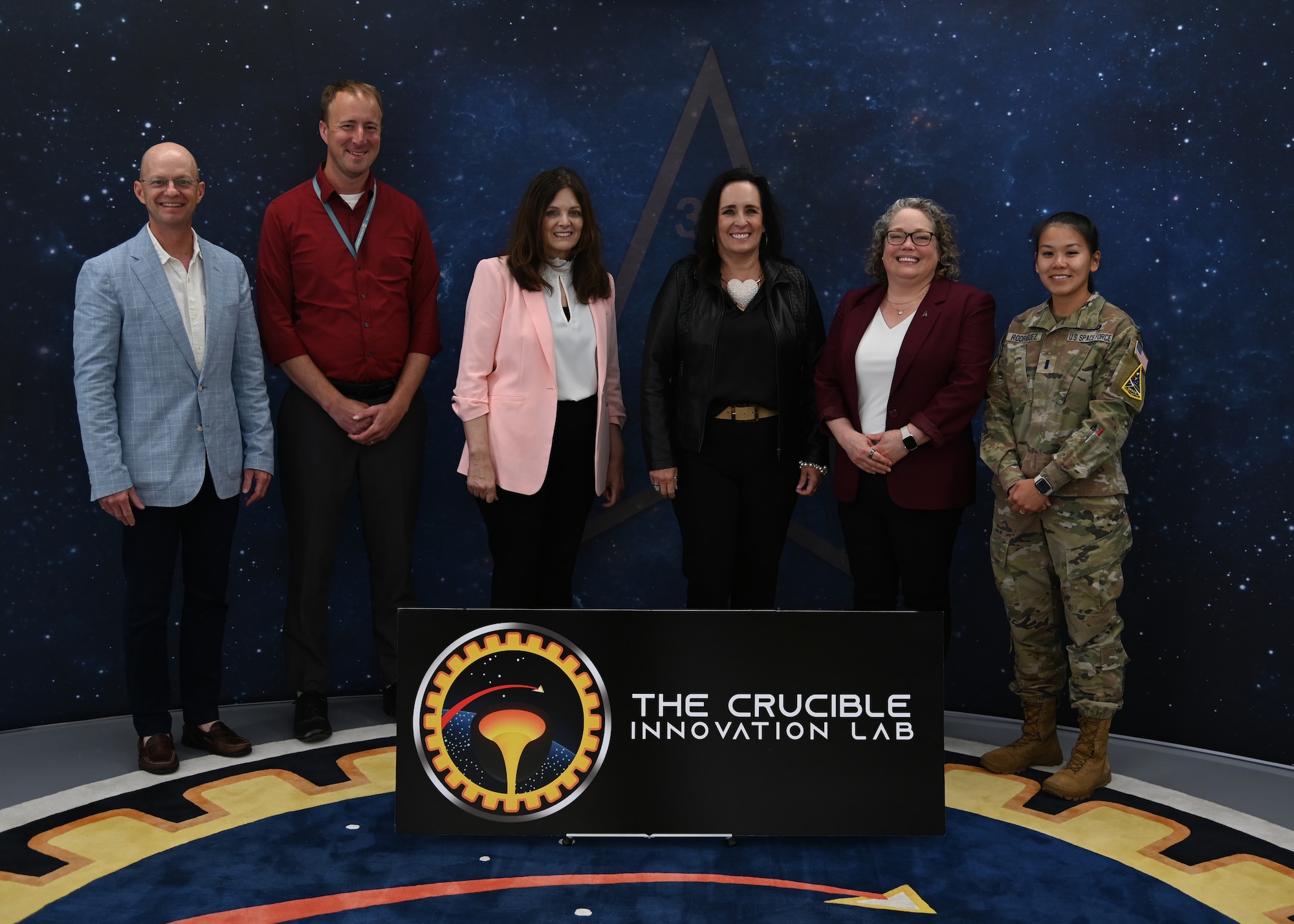 Jennifer Saltzman, spouse of Gen. Chance Saltzman, U.S. Space Force Chief of Space Operations, joined SLD 30 leadership spouses and personnel for a tour of the Crucible Innovation Lab and pose for a photo at Vandenberg Space Force Base.