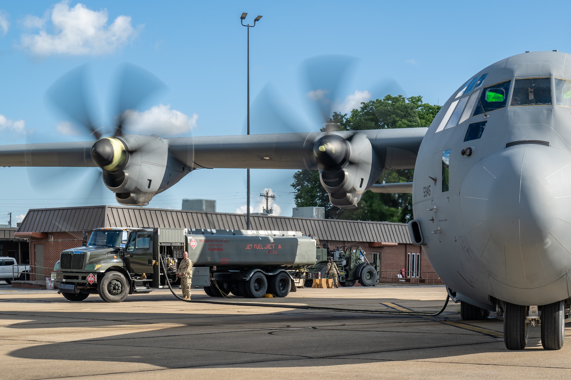 Airmen from the Kentucky Air National Guard’s 123rd Contingency Response Group and 165th Airlift Squadron offload aviation fuel from a C-130J Super Hercules Aircraft to an R-11 refueling truck in support of a major earthquake-response exercise at Barkley Regional Airport in Paducah, Ky., May 13, 2025. The specialized fueling operation, which can be conducted even while aircraft engines are running, is a logistics multiplier that enables C-130s to quickly supply fuel for use by helicopters at remote airfields, which might otherwise lack electrical power or the necessary infrastructure following an earthquake. (U.S. Air National Guard photo by Dale Greer)