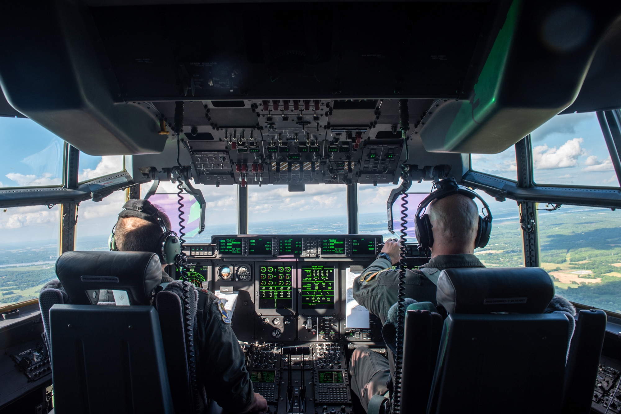 Pilots from the Kentucky Air National Guard’s 165th Airlift Squadron fly a C-130J Super Hercules over Paducah, Ky., May 13, 2025, after delivering cargo for Exercise Grindstone, a three-day earthquake-response exercise. This cargo was used to stand up an aerial port to function as a cargo hub and evacuation center as part of the earthquake scenario. (U.S. Air National Guard photo by Senior Airman Annaliese Billings)