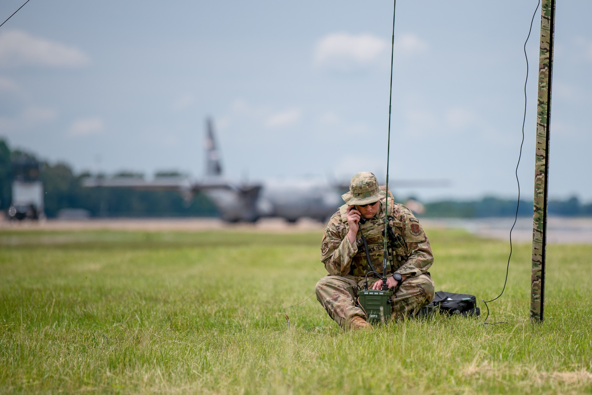 Tech. Sgt. Austin Goldman, a radio systems technician with the 123rd Contingency Response Group, tests radio equipment at Barkley Regional Airport in Paducah, Ky., May 14, 2025, in support of Exercise Grindstone, a major earthquake-response simulation. The unit’s Airmen established a cargo hub at the airport to manage the distribution of humanitarian relief supplies as part of the earthquake scenario. (U.S. Air National Guard photo by Phil Speck)