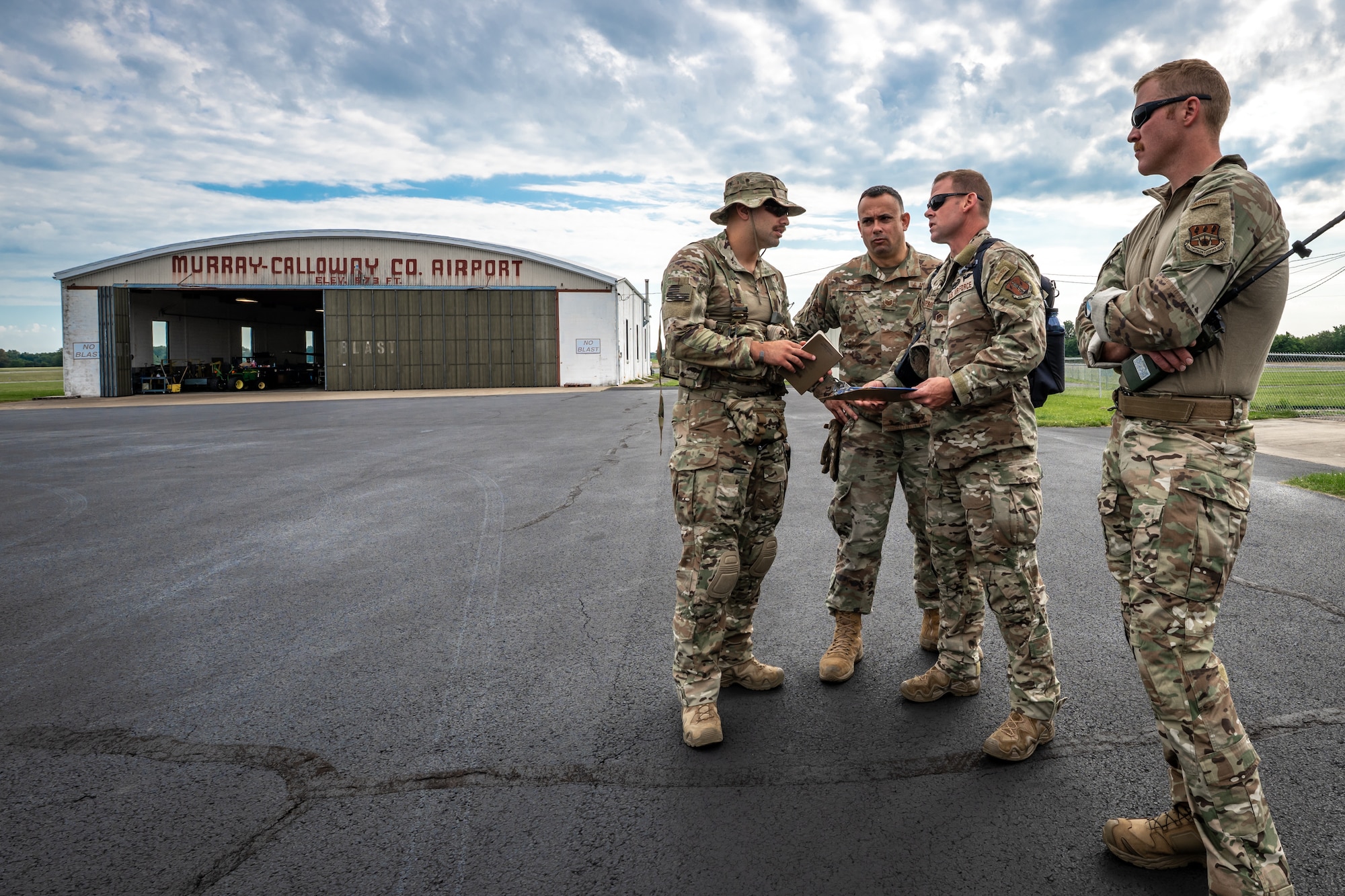 Airmen from the Kentucky Air National Guard’s 123rd Contingency Response Group survey the facilities at Murray-Calloway County Airport in Murray, Ky., May 14, 2025, as part of Exercise Grindstone, a major earthquake-response simulation. Murray lies just east of the New Madrid Seismic Zone, the most active seismic area in the Eastern United States, and could serve as an air hub in the event of an large-scale earthquake. (U.S. Air National Guard photo by Dale Greer)