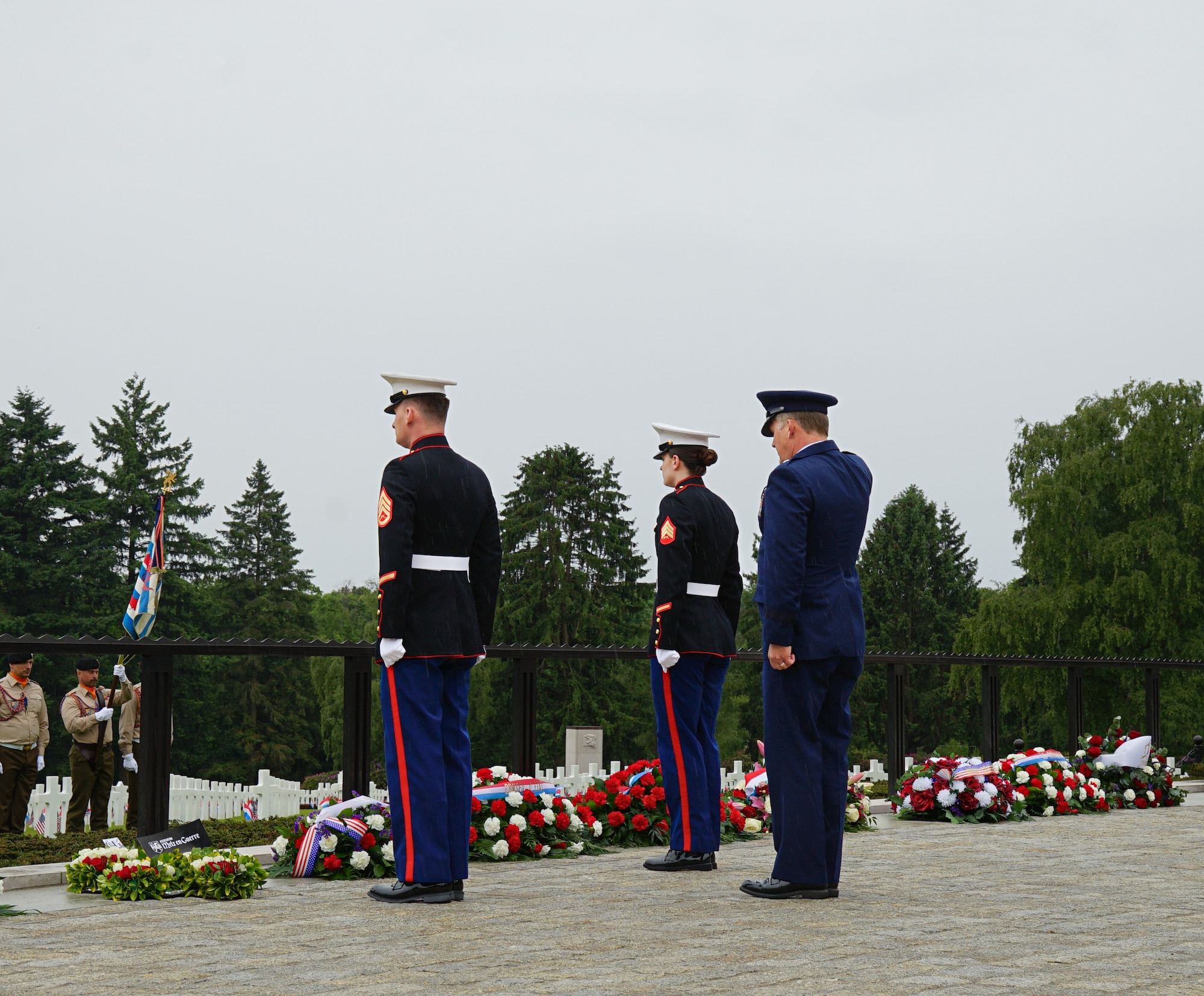 U.S. Air Force Brig. Gen. Troy Havener, Air National Guard Advisor to the U.S. Air Forces in Europe – Air Forces Africa commander, renders honors after laying a wreath during the Memorial Day ceremony at Luxembourg American Cemetery, May 24, 2025. Havener was joined by U.S. Marine Corps Embassy Security Guards in honoring the fallen service members buried at the cemetery. (U.S. Air Force photo by 1st Lt Gabriele Gocso)