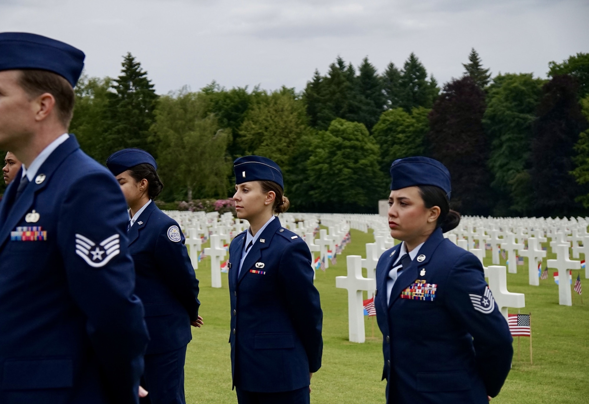 U.S. Airmen assigned to Spangdahlem Air Base stand at parade rest during a troop formation at the Memorial Day ceremony at Luxembourg American Cemetery, May 24, 2025. The ceremony honored the memory of more than 5,000 U.S. service members buried at the cemetery and highlighted the enduring ties between the United States and Luxembourg. (U.S. Air Force photo by 1st Lt Gabriele Gocso)