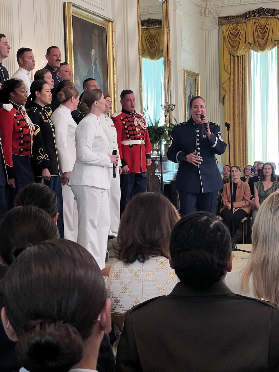 An airman sings.