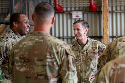 The PACAF commander speaks with Airmen during an immersion tour.