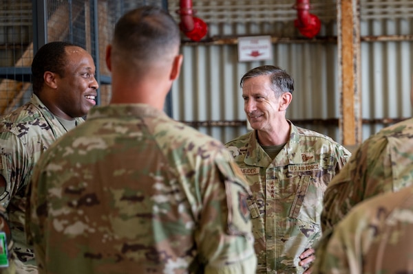 The PACAF commander speaks with Airmen during an immersion tour.