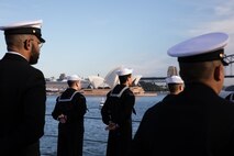 SYDNEY (May 26, 2025) - Sailors assigned to the U.S. 7th Fleet flagship USS Blue Ridge (LCC 19) and 7th Fleet Staff man the rails while pulling into Sydney, Australia for a scheduled port visit, May 26, 2025.  7th Fleet is the U.S. Navy's largest forward-deployed numbered fleet, and routinely interacts and operates with allies and partners in preserving a free and open Indo-Pacific region. (U.S. Navy photo by Lt.j.g. Sarah Merrill)