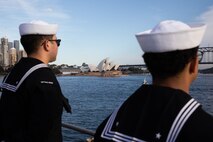 SYDNEY, Australia (May 26, 2025) – Sailors assigned to the U.S. 7th Fleet flagship USS Blue Ridge (LCC 19) and 7th Fleet Staff man the rails while pulling into Sydney, Australia for a scheduled port visit, May 26, 2025.  7th Fleet is the U.S. Navy's largest forward-deployed numbered fleet, and routinely interacts and operates with allies and partners in preserving a free and open Indo-Pacific region. (U.S. Navy photo by Lt.j.g. Sarah Merrill)