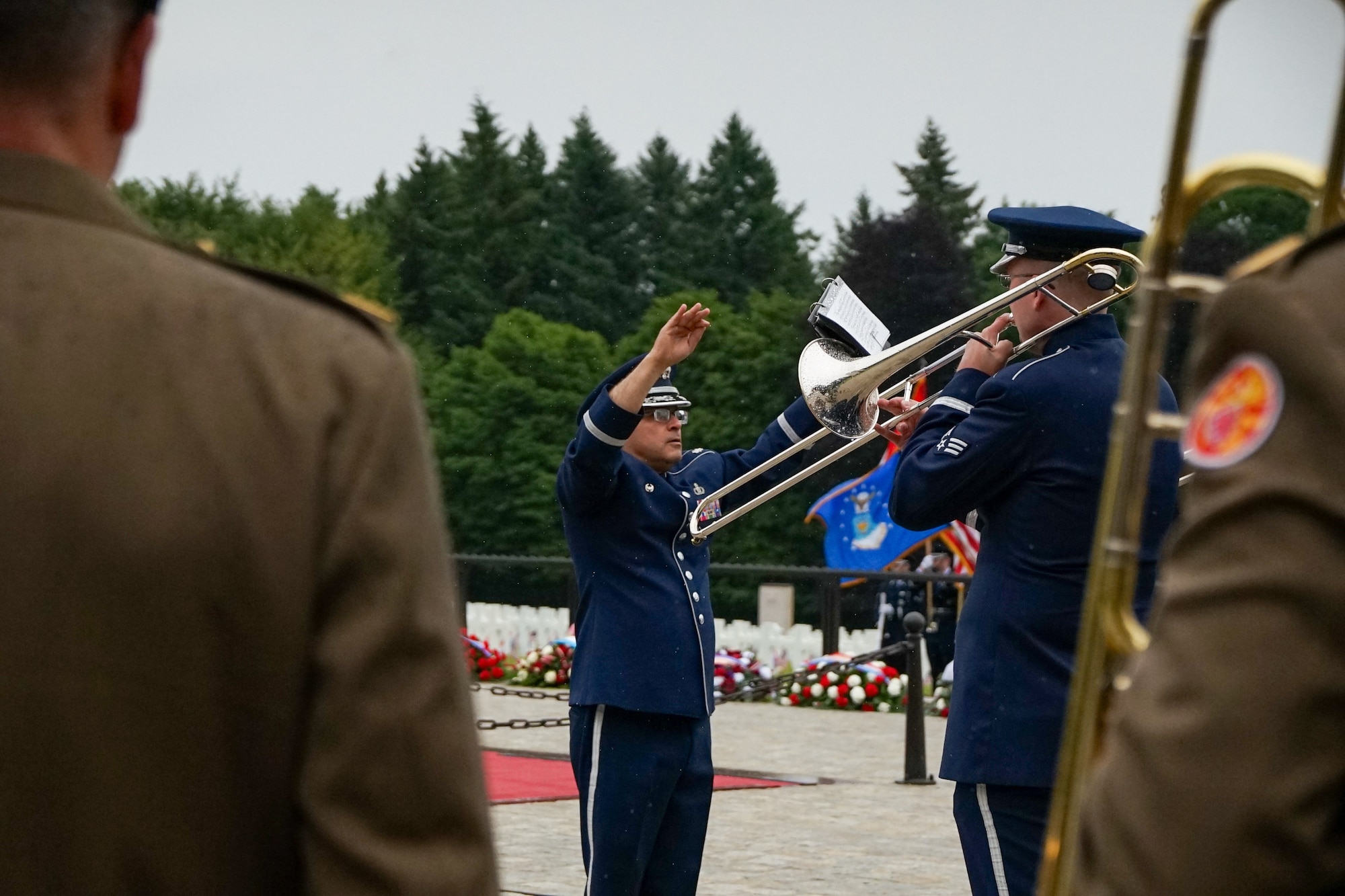 The U.S. Air Forces in Europe Band performs alongside the Luxembourg military band during the Memorial Day ceremony at Luxembourg American Cemetery, May 24, 2025. Their joint performance paid tribute to the more than 5,000 Americans laid to rest at the cemetery and underscored the enduring partnership between the United States and Luxembourg. (U.S. Air Force photo by 1st Lt Gabriele Gocso)