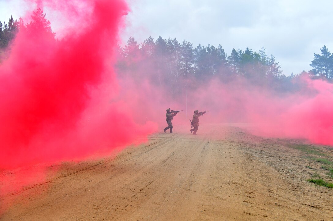 U.S. and French soldiers conduct a joint CBRN and Military Operation Urban Terrain (MOUT) training in Lithuania