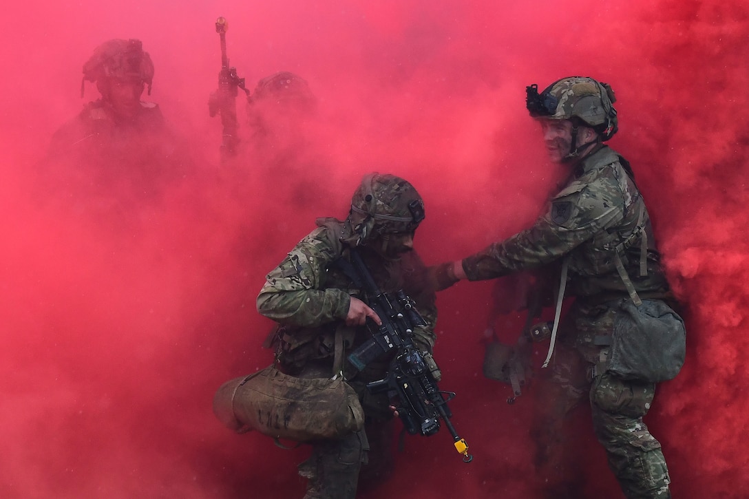 U.S. and French soldiers conduct a joint CBRN and Military Operation Urban Terrain (MOUT) training in Lithuania