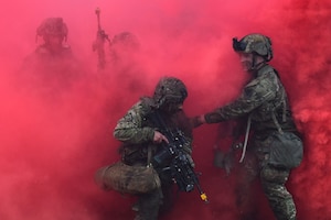 U.S. and French soldiers conduct a joint CBRN and Military Operation Urban Terrain (MOUT) training in Lithuania