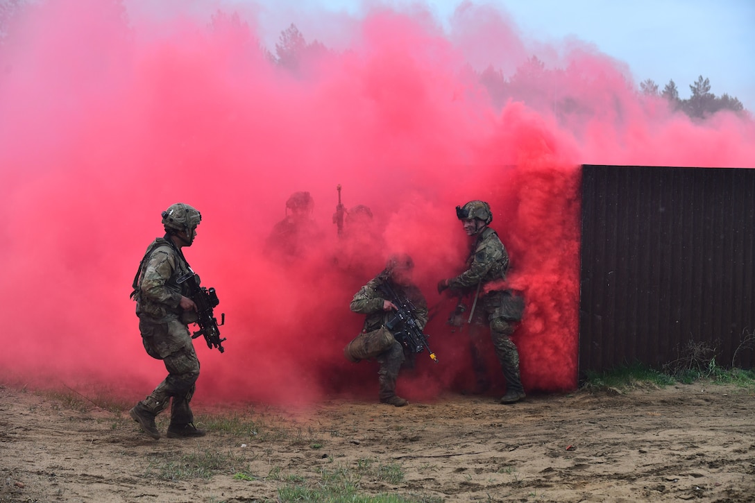 U.S. and French soldiers conduct a joint CBRN and Military Operation Urban Terrain (MOUT) training in Lithuania