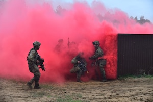 U.S. and French soldiers conduct a joint CBRN and Military Operation Urban Terrain (MOUT) training in Lithuania