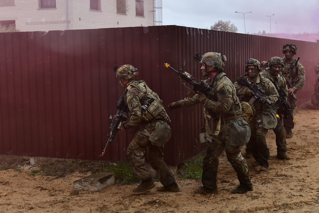 U.S. and French soldiers conduct a joint CBRN and Military Operation Urban Terrain (MOUT) training in Lithuania