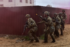 U.S. and French soldiers conduct a joint CBRN and Military Operation Urban Terrain (MOUT) training in Lithuania