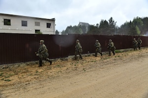 U.S. and French soldiers conduct a joint CBRN and Military Operation Urban Terrain (MOUT) training in Lithuania