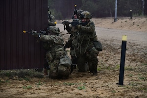 U.S. and French soldiers conduct a joint CBRN and Military Operation Urban Terrain (MOUT) training in Lithuania