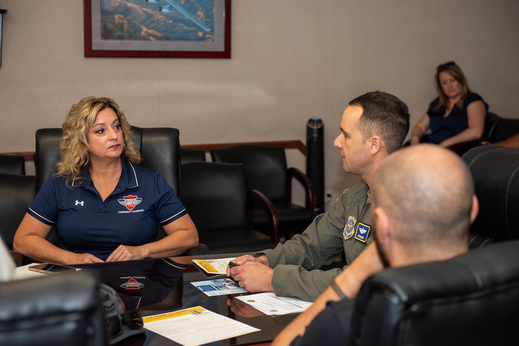 Airman delivers a wing brief to local leadership