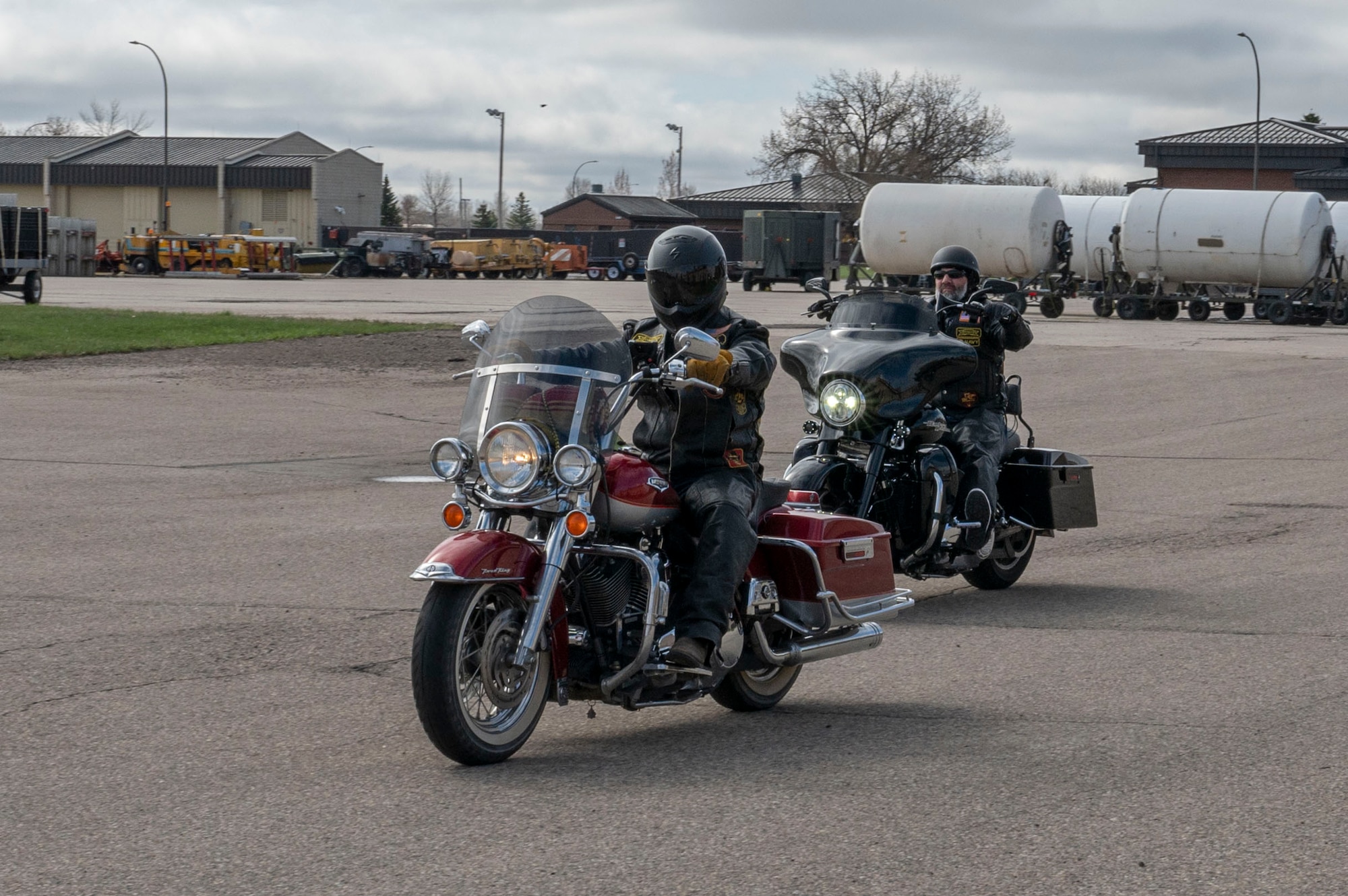 Staff Sgt. Steven Phelps, 319th Logistics Readiness Squadron air transportation function non-commissioned officer in charge and Tyler Okerlund, 319th Contracting Squadron contract specialist, lead the motorcycle safety ride at Grand Forks Air Force Base, N.D., May 2, 2025. The ride was approximately seven hours long, allowing participants to experience the terrain of North Dakota roads. (U.S. Air Force photo by Airman 1st Class Emma Funderburk)