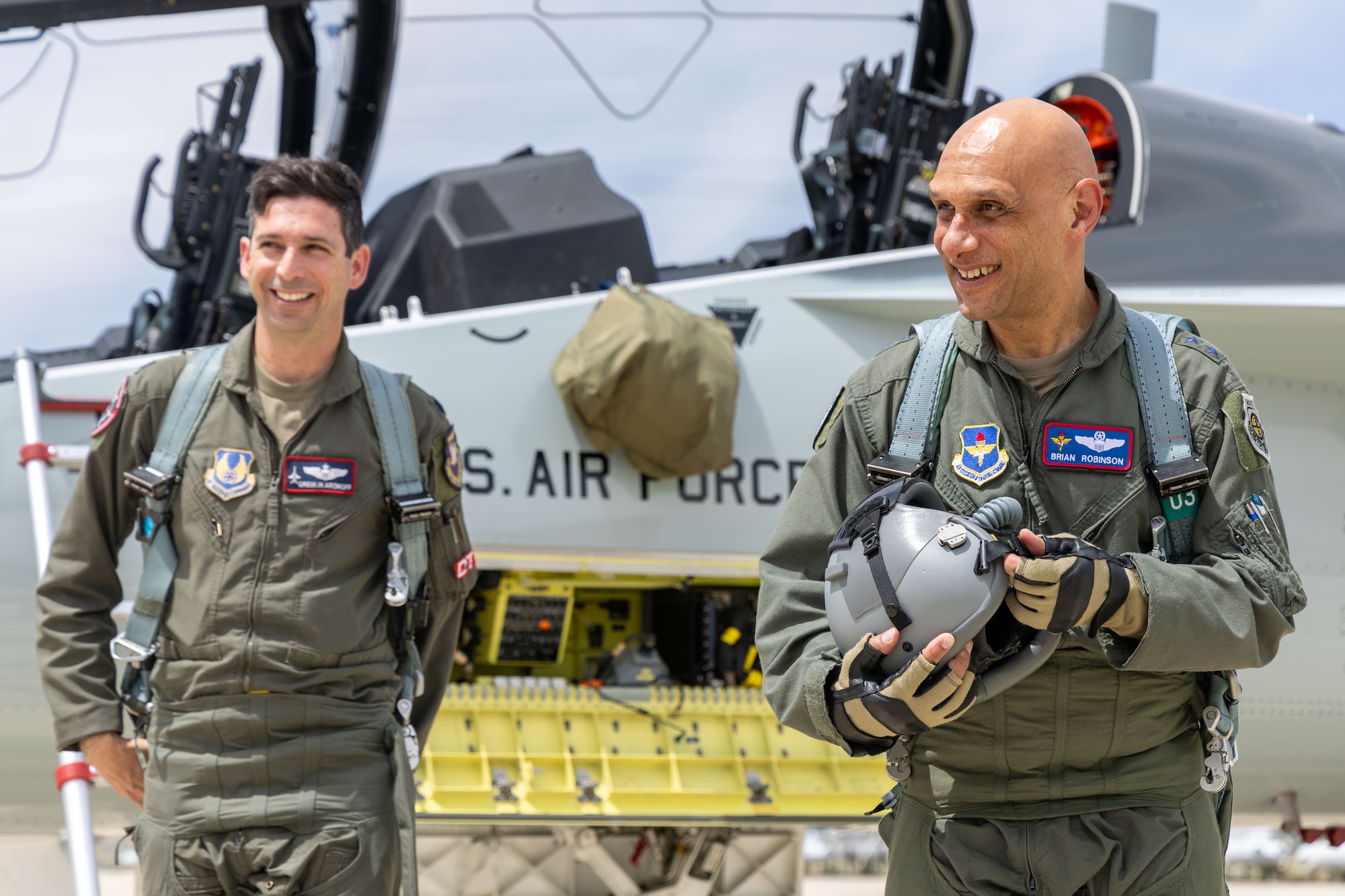Lt. Gen. Brian Robinson, Air Education and Training Command commander, walks away from a T-7A Red Hawk, following a successful flight with instructor Lt. Col. Jonathan Aronoff, 416th Flight Test Squadron, at Edwards Air Force Base, Calif, April 30. Robinson became the first non-test pilot to fly the T-7A. His flight represented a significant demonstration of progress and commitment to modernizing pilot training. (U.S. Air Force photo by Jennifer Healy)