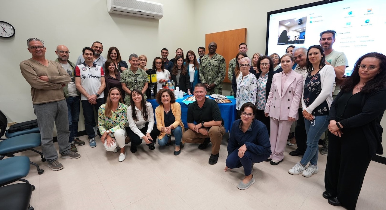 250522-N-DY427-6646 SIGONELLA, Italy. (May 21, 2025)  Captain TaRail A. Vernon, Commanding Officer of U.S. Navy Medicine and Readiness Training Command (NMRTC) Sigonella, recognizes the Civilian workforce during the Civilian Corps Resource Fair. The command-wide event celebrated the unwavering dedication of more than 120 civilian team members, including Local Nationals (LNs) and General Schedule (GS) employees across three locations. Hosted by the Civilian Corps Board (CCB), the fair provided a vibrant space for connection, professional growth, and appreciation. Now in its eighth year, the Civilian Corps is a vital component of Navy Medicine’s enterprise-wide mission. Across the globe, civilian professionals bring continuity, expertise, and innovation to military treatment facilities, ensuring warfighters and their families receive consistent, high-quality care in every theater of operation. (U.S. Navy photo by Lieutenant Commander Brandi Gibson)