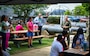 WASHINGTON (April 24, 2025) - Rear Adm. David Faehnle, commandant, Naval District Washington, addresses military and civilian staff members during the annual Naval District Washington command potluck. (U.S. Navy Photo by Mass Communication Specialist 1st Class Griffin Kersting)