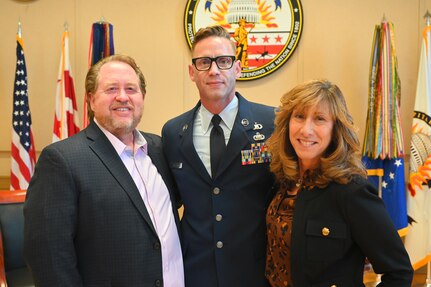 U.S. Air Force Master Sgt. Jason M. Melton, PA superintendent, Headquarters District of Columbia Air National Guard (HQ/DCANG-PA), and Dr. Christine Going, senior advisor for the VA's Food Security Office, stand for a photograph during a ceremony at the D.C. Armory, on Oct. 20, 2024. Recently, Dr. Going was recognized with the Employer Support of the Guard and Reserve (ESGR) Patriot Award for her support to the organization. The Patriot Award reflects the efforts made to support Citizen Airmen and Soldiers through a wide-range of measures including flexible schedules, time off prior to and after deployment, caring for families, and granting leaves of absence if needed.