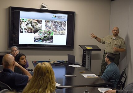 Jacob Doyle, park manager of Fort Frederick State Park in Washington County, Maryland, discusses snakes, spiders and ticks commonly found in Maryland during AMLC’s safety stand-down May 14 at Fort Detrick, Maryland.