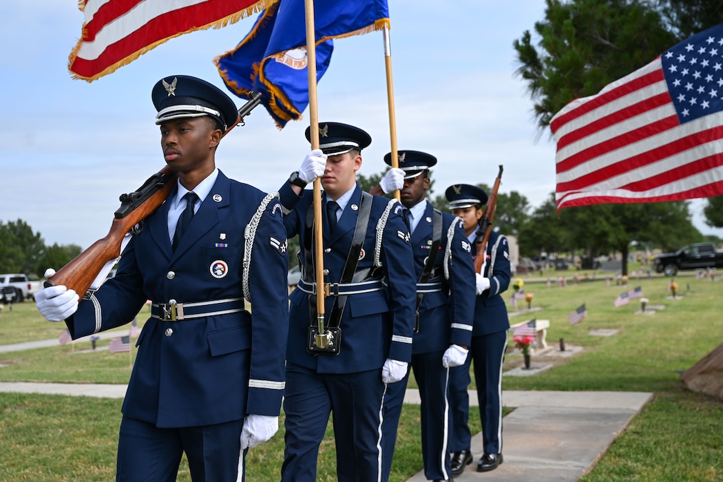Goodfellow Air Force Base Honor Guard members present the colors during the 2025 Memorial Day Remembrance Ceremony at Johnson’s Lawnhaven Memorial Gardens, San Angelo, Texas, May 26, 2025. Members of Goodfellow Air Force Base and veterans of the San Angelo community came together to honor those who made the ultimate sacrifice. (U.S. Air Force photo by Senior Airman Evelyn J. D’Errico)