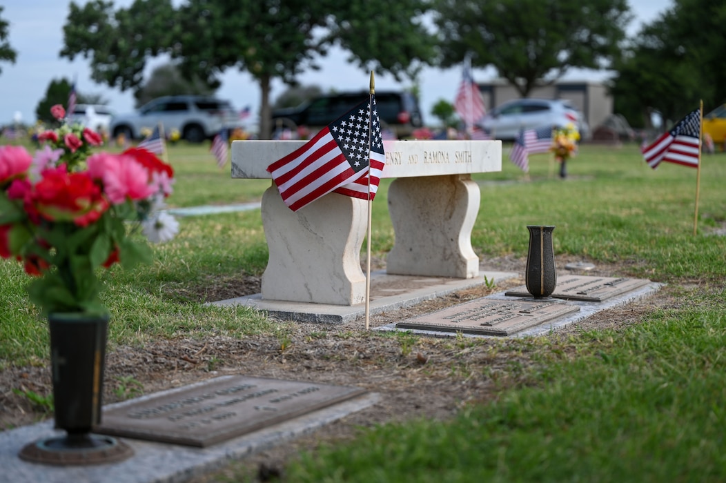 An American flag decorates the headstone during the 2025 Memorial Day Remembrance Ceremony at Johnson’s Lawnhaven Memorial Gardens, San Angelo, Texas, May 26, 2025. Representatives of different organizations and families place flags on the headstones to honor veterans and fallen service members. (U.S. Air Force Photo by Senior Airman Evelyn J. D’Errico)