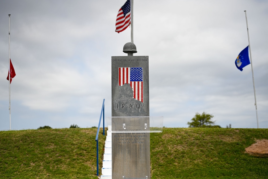 The American flag and service branch flags stand at half-staff at the Operation Iraqi Freedom Memorial during the 2025 Memorial Day Remembrance Ceremony at Johnson’s Lawnhaven Memorial Gardens, San Angelo, Texas, May 26, 2025. Memorial Day is a time to honor the service and sacrifice of service members who gave their lives in the defense of the United States. (U.S. Air Force photo by Senior Airman Evelyn J. D’Errico)
