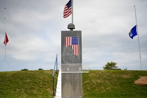 The American flag and service branch flags stand at half-staff at the Operation Iraqi Freedom Memorial during the 2025 Memorial Day Remembrance Ceremony at Johnson’s Lawnhaven Memorial Gardens, San Angelo, Texas, May 26, 2025. Memorial Day is a time to honor the service and sacrifice of service members who gave their lives in the defense of the United States. (U.S. Air Force photo by Senior Airman Evelyn J. D’Errico)