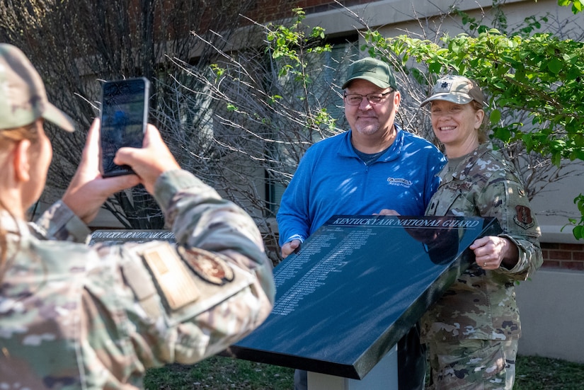 Current and former members of the 123rd Airlift Wing gather at the Kentucky Air National Guard Base in Louisville, Ky., April 12, 2025, for a ceremony unveiling a new marble tablet honoring retirees.