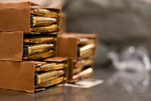 A case of bullets sits ready for use for the M4 firing rifle at Minot Air Force Base, May 8, 2025. The bullets were used for Airmen to train on at the Combat Arms Training and Maintenance course.(U.S. Air Force photo by Airman 1st Class Anthony Ramey)
