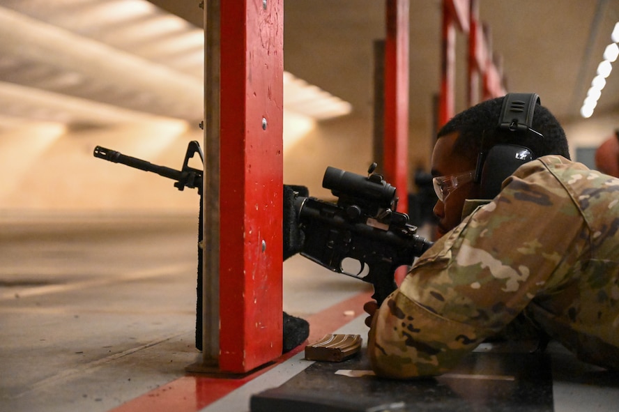 U.S. Air Force Senior Airman Deltron Banks, heavy equipment operator from the 5th civil engineering squadron, aims down range with the M4 at Minot Air Force Base, May 8, 2025. Banks trained on the M4 as a part of the Combat Arms Training and Maintenance course program designed to make him a more lethal Airman.(U.S. Air Force photo by Airman 1st Class Anthony Ramey)