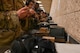 A group of Airmen load bullets into the M4 magazine on Minot Air Force Base, May 8, 2025. Airmen practiced loading bullets into the M4 rifle as a part of the Combat Arms Training and Maintenance.(U.S. Air Force photo by Airman 1st Class Anthony Ramey)