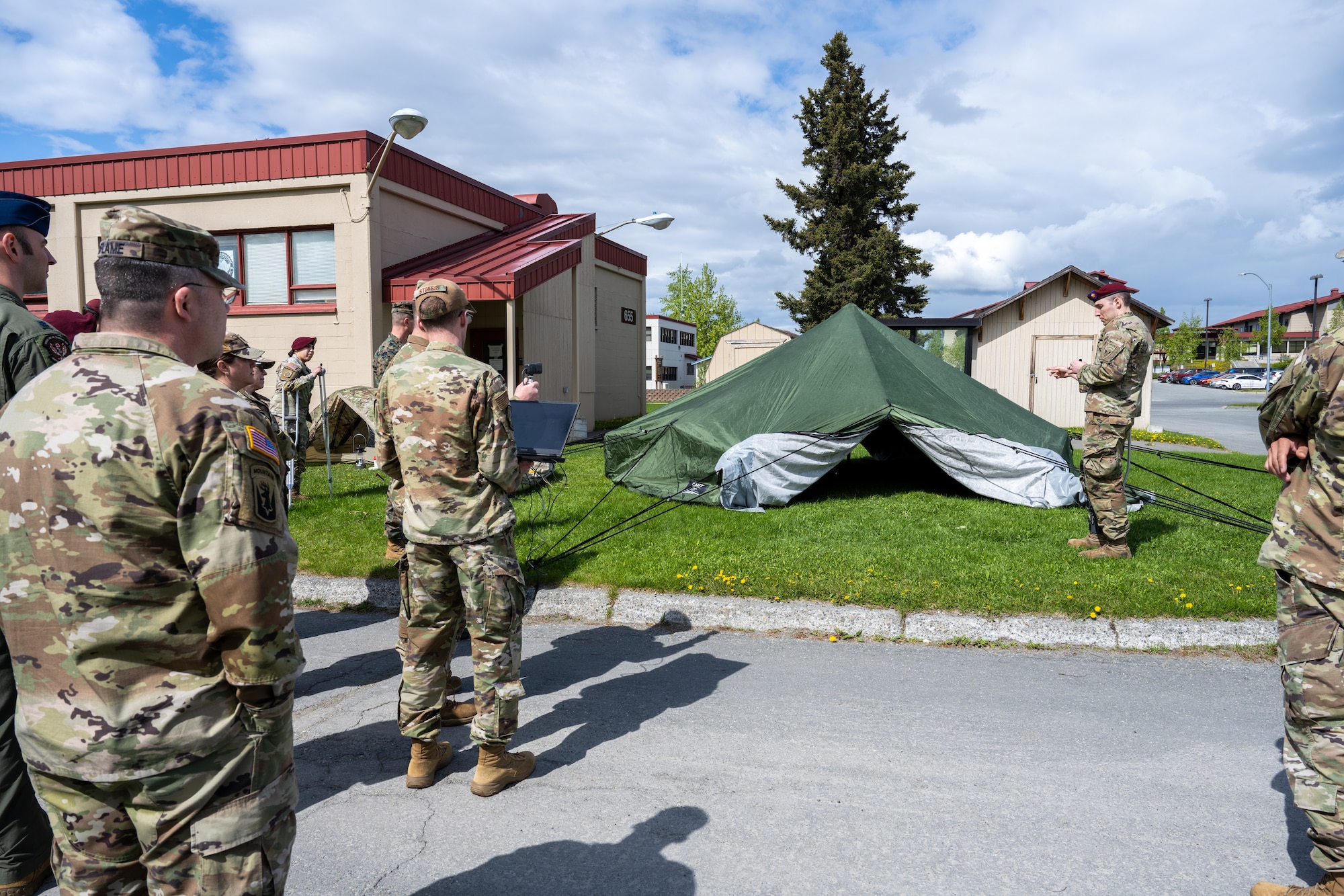 The symposium was a three-day course that trained medical personnel on operating in harsh weather environments. The 11th Airborne Division and the 673d MDG presented briefs, showcased hands-on techniques and demonstrated the use of mission-ready equipment.